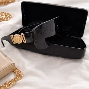 Versace Women's Sunglasses in Black with Gold Details